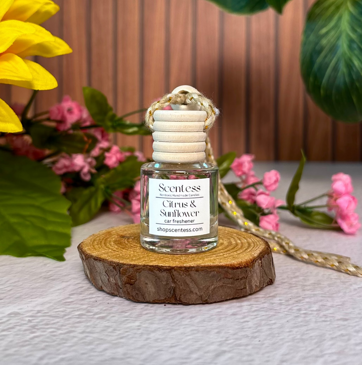 Non-toxic citrus and sunflower scented car freshener